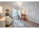 Cozy living room with access to a balcony and bright natural light at 2011 N Highway 17 # 2300F, Mount Pleasant, SC 29466