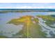 Aerial view of an island with marsh grasses and a walking path at 2076 Rookery Ln, Charleston, SC 29414
