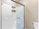 Clean bathroom with walk-in shower featuring glass door and tile surround at 2076 Rookery Ln, Charleston, SC 29414