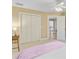 Bedroom with a ceiling fan, a closet, and a door at 2076 Rookery Ln, Charleston, SC 29414