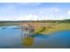 Elevated shot of a serene dock featuring picturesque views of the tranquil marsh and surrounding nature at 2076 Rookery Ln, Charleston, SC 29414