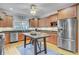 Kitchen featuring stainless steel appliances and a central island for dining at 2076 Rookery Ln, Charleston, SC 29414