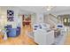 Bright living room showcasing hardwood floors and coastal-inspired decor at 2076 Rookery Ln, Charleston, SC 29414