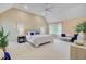 Spacious main bedroom features vaulted ceilings, a ceiling fan, ensuite, and large windows at 2076 Rookery Ln, Charleston, SC 29414