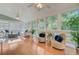 Bright sunroom with windows offering scenic outdoor views and natural light at 2076 Rookery Ln, Charleston, SC 29414
