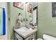 Cozy bathroom features a modern sink and vanity, complemented by rustic decor at 21 Rivers Point Row # Apt 11 C, Charleston, SC 29412