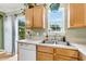 Efficient kitchen featuring a stainless steel sink and access to the backyard at 21 Rivers Point Row # Apt 11 C, Charleston, SC 29412