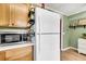 Practical kitchen with white appliances, ample counter space, and storage at 21 Rivers Point Row # Apt 11 C, Charleston, SC 29412