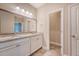 Bathroom features a granite countertop, double sinks, and ample lighting at 212 Palmetto Walk Dr, Summerville, SC 29486
