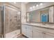 Bathroom featuring granite countertops, double sinks, and a tiled shower at 212 Palmetto Walk Dr, Summerville, SC 29486