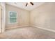 Comfortable bedroom featuring neutral carpet and a large window allowing for ample natural light at 212 Palmetto Walk Dr, Summerville, SC 29486