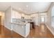 Spacious kitchen with stainless steel appliances, granite counters, and white cabinets at 212 Palmetto Walk Dr, Summerville, SC 29486