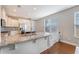 Kitchen with granite countertops, stainless steel appliances, and views to the breakfast area at 212 Palmetto Walk Dr, Summerville, SC 29486