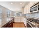 Kitchen with granite counters, stainless steel appliances, and center island overlooking breakfast area at 212 Palmetto Walk Dr, Summerville, SC 29486