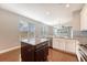 Well-lit kitchen featuring stainless steel appliances, granite counters, and a center island at 212 Palmetto Walk Dr, Summerville, SC 29486