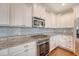 Kitchen featuring stainless steel appliances, granite counters, and ample cabinet space at 212 Palmetto Walk Dr, Summerville, SC 29486