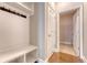 Mudroom features a built-in bench with storage and coat hooks at 212 Palmetto Walk Dr, Summerville, SC 29486