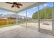 Covered patio with a fire pit overlooking the backyard, perfect for entertaining at 212 Palmetto Walk Dr, Summerville, SC 29486