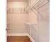 Spacious walk-in closet with wire shelving and hardwood floors, offering ample storage space at 212 Palmetto Walk Dr, Summerville, SC 29486
