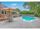 Backyard with a large pool and an outdoor seating area with a grill at 2120 Fife Ln, Charleston, SC 29414