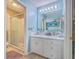 Bright bathroom with a large mirror, vanity, and step-in shower at 2120 Fife Ln, Charleston, SC 29414