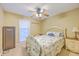 A cozy bedroom featuring a ceiling fan, window, and double bed at 2120 Fife Ln, Charleston, SC 29414