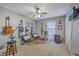 Music room with guitars mounted on the walls, amp and lighting at 2120 Fife Ln, Charleston, SC 29414