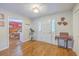 Spacious foyer features hardwood floors, a large front door, and views into the dining room at 2120 Fife Ln, Charleston, SC 29414