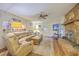 Inviting living room features a brick fireplace, comfortable seating, and ample natural light, perfect for relaxation and gatherings at 2120 Fife Ln, Charleston, SC 29414