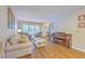 Cozy living room with hardwood floors, comfortable seating, and ample natural light at 2120 Fife Ln, Charleston, SC 29414