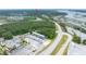 Aerial shot shows proximity of boat storage area to wooded areas and river at 2132 Summerwood Dr, Mount Pleasant, SC 29466