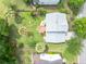 Aerial view showcasing the backyard, deck, mature trees and landscaping at 2132 Summerwood Dr, Mount Pleasant, SC 29466