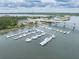 Stunning marina view from above filled with docked yachts and boats, next to a restaurant at 2132 Summerwood Dr, Mount Pleasant, SC 29466