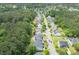 Aerial view of a well-maintained suburban street with neat lawns and various home styles at 2132 Summerwood Dr, Mount Pleasant, SC 29466
