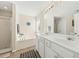 This well-lit bathroom includes a soaking tub, glass enclosed shower, and a double vanity at 2132 Summerwood Dr, Mount Pleasant, SC 29466