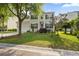 Two-story home with manicured lawn, showcasing its charming curb appeal and landscaping at 2132 Summerwood Dr, Mount Pleasant, SC 29466