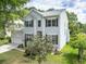 Traditional two-story home with light siding, red shutters, and manicured front lawn at 2132 Summerwood Dr, Mount Pleasant, SC 29466