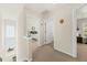 Hallway featuring entry to bedrooms and a staircase to the lower level at 2132 Summerwood Dr, Mount Pleasant, SC 29466