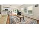 Open-concept living room with hardwood floors, access to a patio and bright natural light at 2132 Summerwood Dr, Mount Pleasant, SC 29466