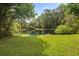 Scenic pond view surrounded by trees offering a tranquil and private setting at 2132 Summerwood Dr, Mount Pleasant, SC 29466