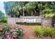 Beautiful Blackberry Creek entrance with lush plants and brick structure at 218 Austin Creek Ct, Summerville, SC 29483