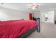 A spacious main bedroom featuring a ceiling fan and plenty of natural light at 218 Austin Creek Ct, Summerville, SC 29483