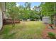 Expansive backyard featuring a large deck, ample green space, and additional storage sheds at 2220 Pinehurst Ave, Charleston, SC 29414