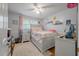 Charming bedroom with pastel walls, decorative accents, and hardwood floors, creating a sweet and cozy retreat at 2220 Pinehurst Ave, Charleston, SC 29414