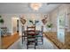 Elegant dining room featuring a wooden table with chairs, a chandelier, and stylish decor at 2220 Pinehurst Ave, Charleston, SC 29414