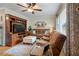 Cozy living room with a plush sectional sofa, entertainment center, and natural light streaming through the windows at 2220 Pinehurst Ave, Charleston, SC 29414