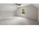 Bedroom with natural light from the window, carpeted floors, and an angled ceiling at 240 Eagle Ridge Rd, Summerville, SC 29485
