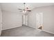 Primary bedroom with a vaulted ceiling, neutral carpeting, and views of the back yard at 240 Eagle Ridge Rd, Summerville, SC 29485