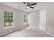 Bedroom with natural light from two windows and a ceiling fan at 240 Eagle Ridge Rd, Summerville, SC 29485