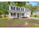 Charming two-story home with a well-manicured lawn and front porch at 240 Eagle Ridge Rd, Summerville, SC 29485